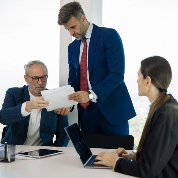 Attorneys explaining document to client