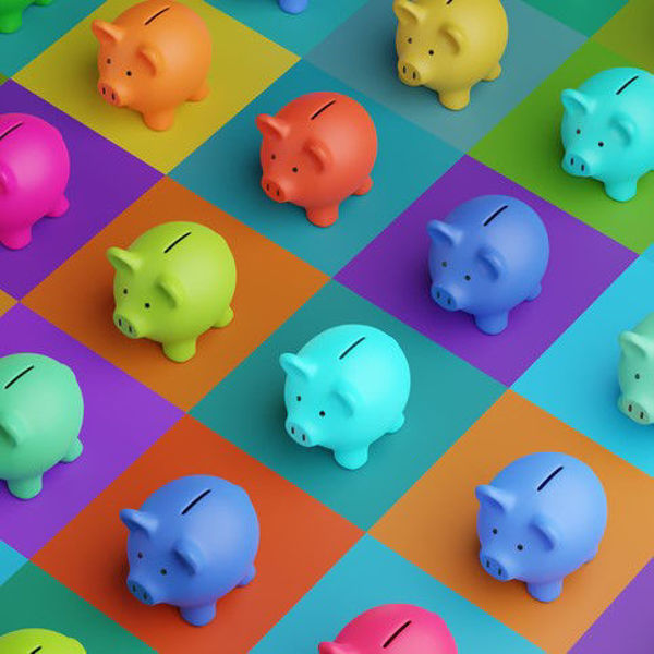 Photo of a multi-colored piggy banks arranged on a multi-colored square grid. 