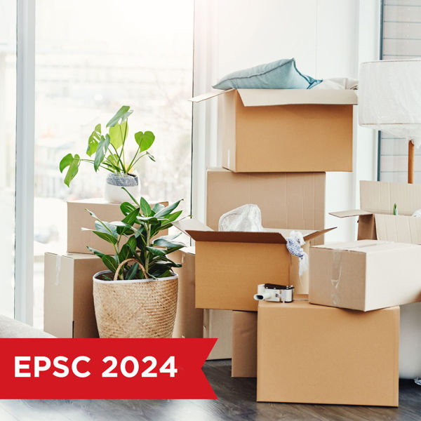 Piled moving boxes and possessions