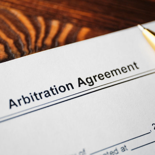 Close-up of an arbitration agreement document