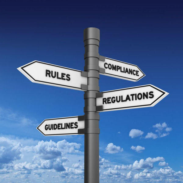 Road sign with labels for Compliance, Rules, and so forth